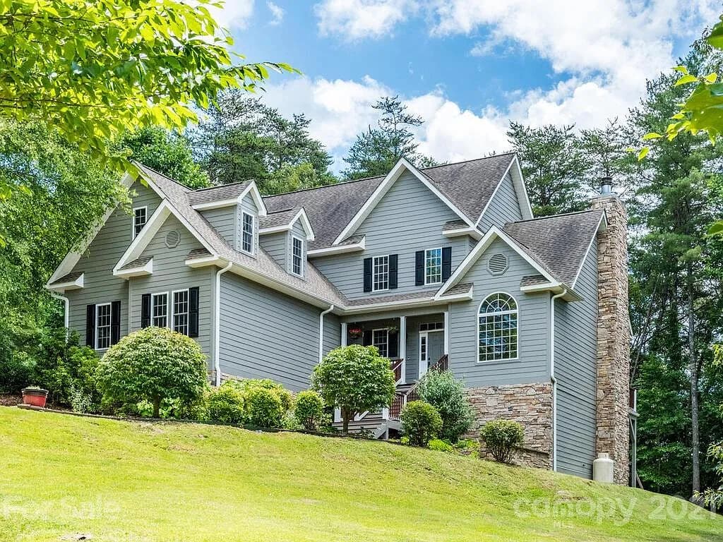 Home with gabled roof addition in Settlers Cove