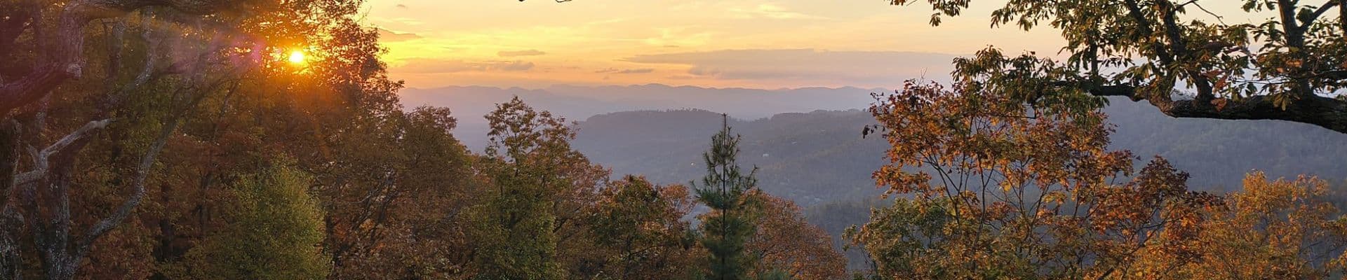 Sunset over the Blue Ridge Mountains from a custom home deck